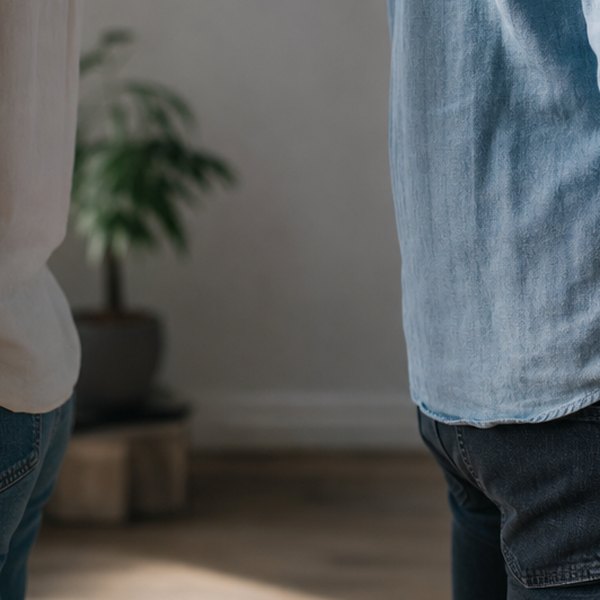 Two people with hands not touching — detail